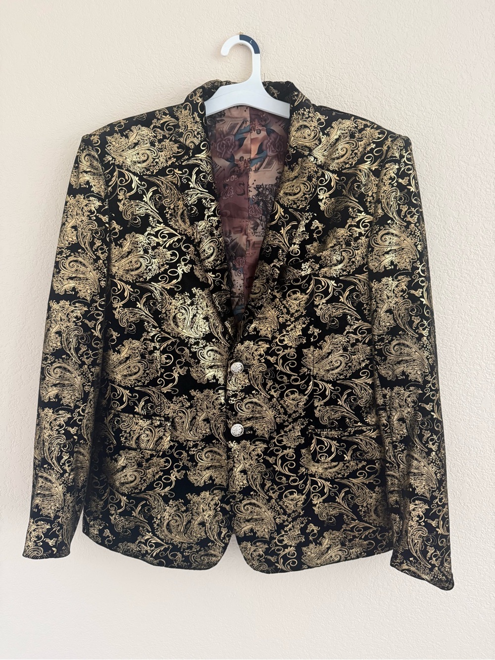Man’s black and gold blazer size large